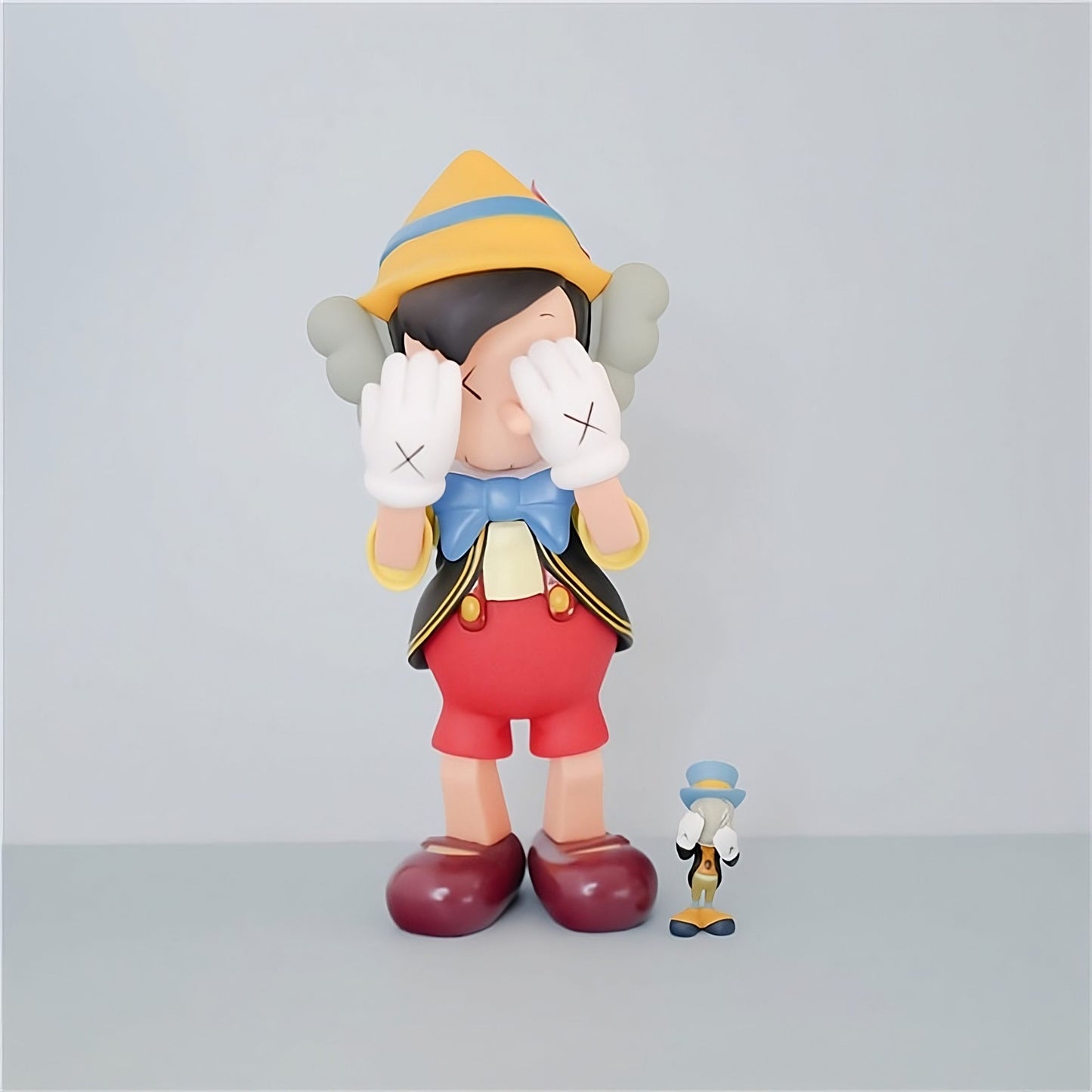 KAWS Pinocchio & Jiminy Cricket Figure